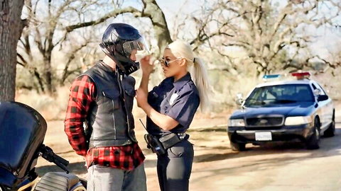 Bridgette B as busty police MILF in uniform with biker, seductive encounter