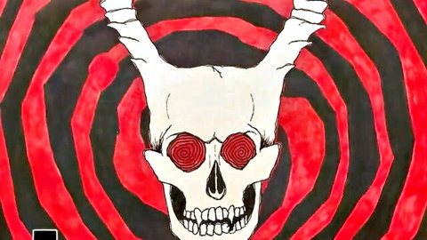 Hypnotic demonic skull with swirling red eyes and horns, artistic adult theme