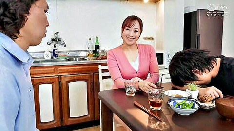 Yu Kawakami smiling in kitchen adultery setup with sleeping husband