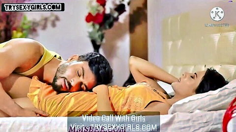 Indian couple in steamy bed cuddle, seductive embrace and cleavage