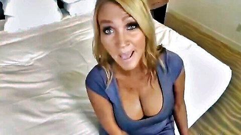 Blonde MILF in low-cut blue dress POV tease, big tits visible