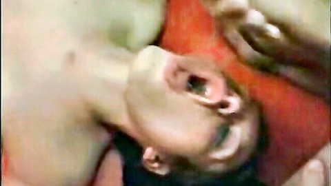 German BDSM submissive woman in ecstasy, head tilted back mouth open