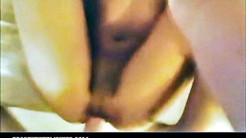 Blurry closeup of amateur Asian pussy spread wide by pale fingers with creamy lube