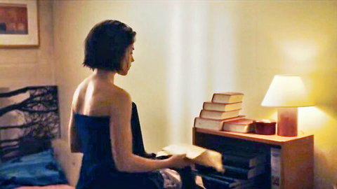 Alice Isaaz bare back in black dress, topless reading scene from 66-5 series
