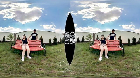 Teen couple sitting on outdoor bench in casual clothes, amateur VR video thumbnail