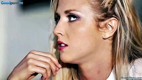 Seductive blonde in profile view teasing pink lips with fingers closeup