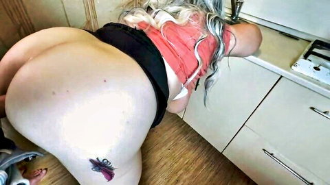 BBW mature woman bends over kitchen counter exposing huge bare ass with panties pulled down
