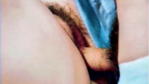 Hard cock rubbing against woman's hairy pussy with blue panties pulled aside