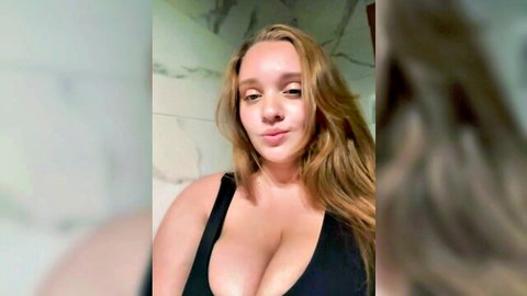 Annitajune curvy blonde in tight black top flaunting massive cleavage