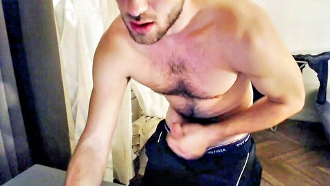 Hairy muscular gay guy Shane Allen teases with hand in jeans, amateur solo