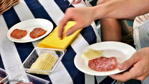 Passion HD outdoor picnic scene with salami, cheese, and teasing hands
