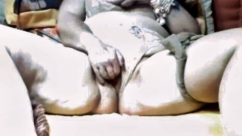 BBW tattooed amateur spreading her shaved pussy lips wide with fingers