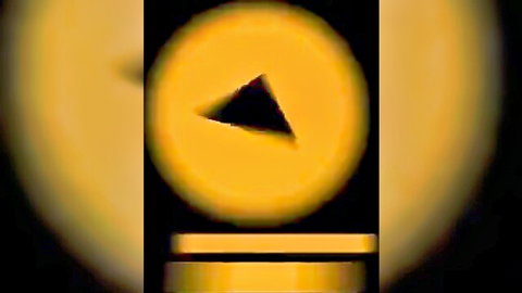 Yellow glowing play button overlay on intense gay rough anal sex video thumbnail