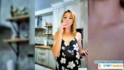 NaughtyAna smoking seductively in black floral dress, solo tease