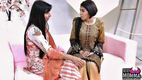 Sahara Knite and Aaliyah Yasin in intimate Desi lesbian chat on couch