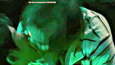 Blurry intimate kiss between two men in Boys Love scene