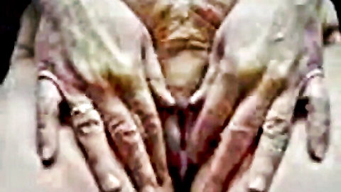 BDSM torture close-up: hands spreading exposed pussy in intense session