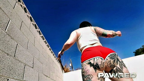 Ciara Sinn's bouncy big booty in red shorts, tattooed brunette posing outdoors