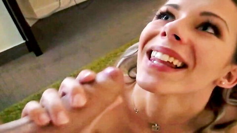 Blonde smiling excitedly while gripping thick hard cock with both hands handjob
