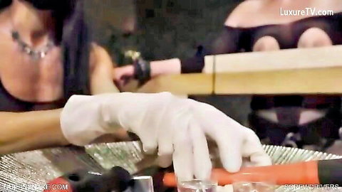 Nazryana and Abby in gloves handling screwdrivers for fetish insertion play