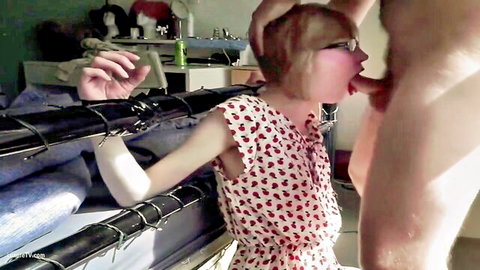 Bound blonde with glasses in polka dot dress deepthroats cock
