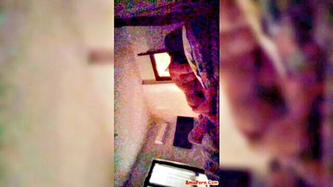 Blurry amateur Italian woman on bed, eager for sex after work