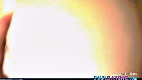 Blank frame overlaid with multiple SHAREDATING.COM watermarks in yellow and magenta