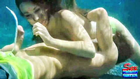 Kimber Lee giving underwater blowjob to cock