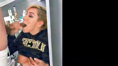 Blonde with massive tits deepthroats cock roughly in bathroom mirror with Guess hoodie down