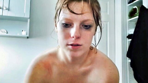 Wet amateur babe exposes perky tits in steamy bathroom mirror selfie
