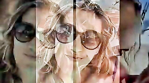 Blonde woman in sunglasses smiling playfully outdoors, wavy hair tease