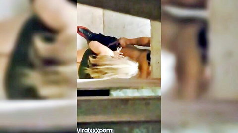 Blonde woman caught giving secret blowjob to man in amateur video