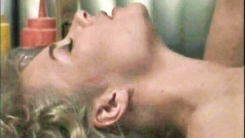 Vintage blonde babe lies back with mouth wide open during sensual blowjob