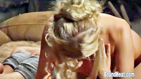 Nude blonde lesbian slave bent over couch with femdom mistress gripping her hair forcing face down