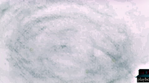 Blurry close-up of pink erect nipple on huge natural tits