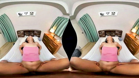 Asian beauty in pink top spreads legs wide in VR erotic solo pose
