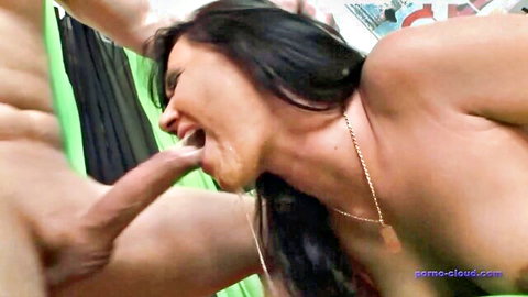 Brunette with tits out gapes mouth wide as thick cock rubs her tongue