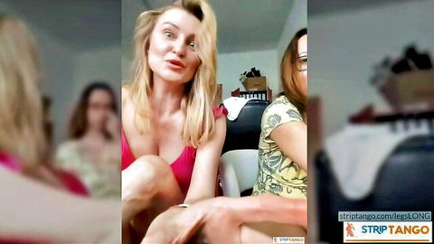 Blonde with long legs in pink top during live webcam sex chat