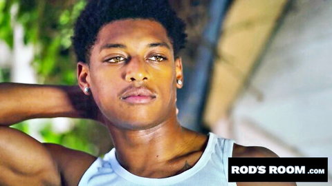 DeAngelo Jackson in white tank top, sexy outdoor pose