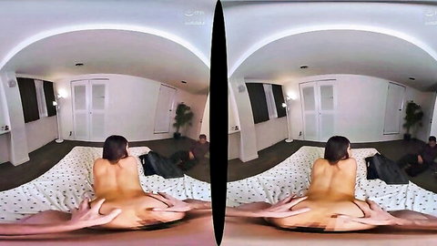 Gorgeous Asian MILF naked on bed, bending over with hands spreading big ass
