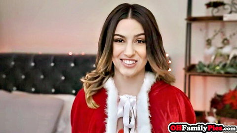Seductive brunette stepsister in sexy Santa dress teases viewer