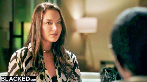 Brunette with huge cleavage in zebra print top talks seductively to man from behind