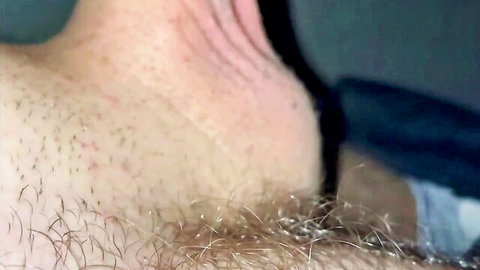 Close-up of hairy DILF neck and shoulders straining in sensual gay scene