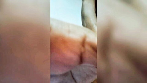 Blurry closeup of cute teen girl's pale skin and body