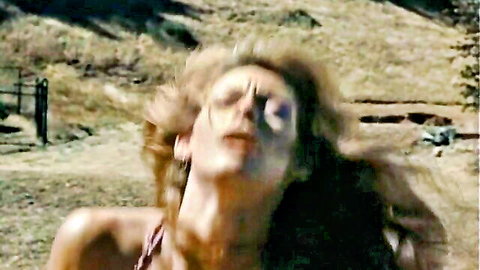 Ecstatic mature blonde with big tits cleavage throws head back moaning outdoors