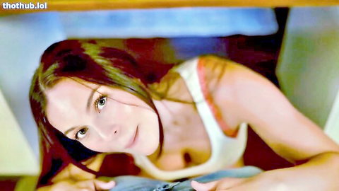 Puffin ASMR teases with cleavage in white tank top, close-up view