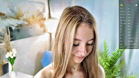 Alaynaschoville blonde teen model smiling while showing her perky tits on webcam