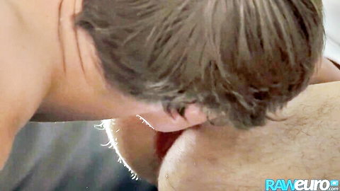 Muscular guy rimming hairy white ass with tongue in closeup gay action