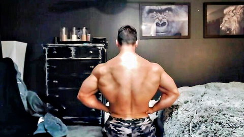 Muscular shirtless man standing from behind, nonnude solo pose by Alexiarain