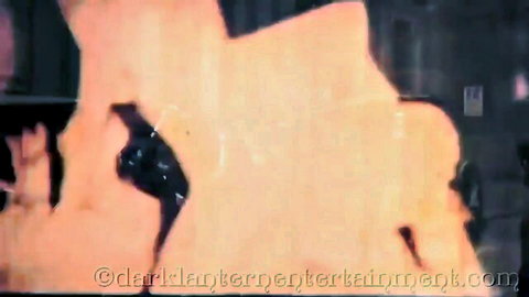 Victorian woman in dark lantern-lit softcore confession scene